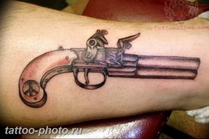 фото тату револьвер 24.12.2018 №145 - photo tattoo revolver - tattoo-photo.ru