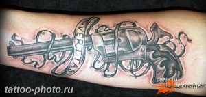 фото тату револьвер 24.12.2018 №191 - photo tattoo revolver - tattoo-photo.ru