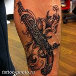 фото тату револьвер 24.12.2018 №355 - photo tattoo revolver - tattoo-photo.ru