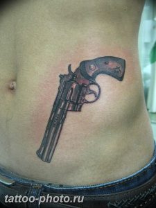 фото тату револьвер 24.12.2018 №383 - photo tattoo revolver - tattoo-photo.ru