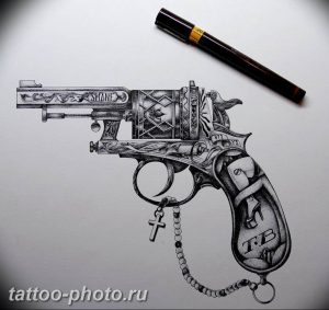 фото тату револьвер 24.12.2018 №405 - photo tattoo revolver - tattoo-photo.ru