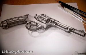 фото тату револьвер 24.12.2018 №431 - photo tattoo revolver - tattoo-photo.ru