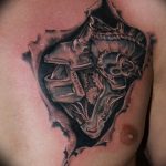 фото тату биомеханика на груди 06.04.2019 №016 - chest biomechanics tatt - tattoo-photo.ru