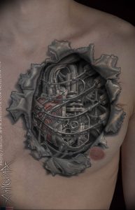 фото тату биомеханика на груди 06.04.2019 №030 - chest biomechanics tatt - tattoo-photo.ru