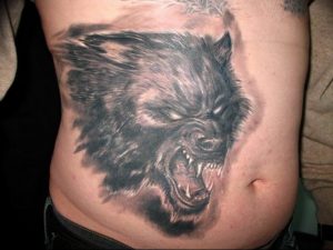 фото тату волчий оскал 01.05.2019 №065 - wolf grin tattoo - tattoo-photo.ru