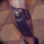 фото биомеханика на икре тату 06.04.2019 №040 - biomechanics on the calf - tattoo-photo.ru