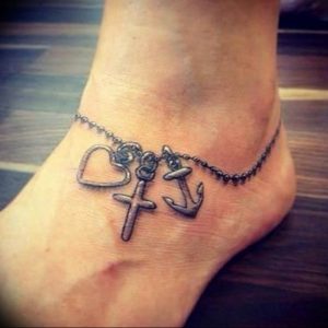 фото крест оберег тату 03.04.2019 №003 - cross charm tattoo - tattoo-photo.ru