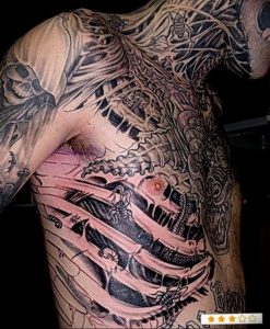 фото мужская тату биомеханика 06.04.2019 №015 - male tattoo biomechani - tattoo-photo.ru