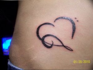 фото тату басовый ключ 01.05.2019 №158 - tattoo bass clef - tattoo-photo.ru