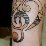 фото тату басовый ключ 01.05.2019 №163 - tattoo bass clef - tattoo-photo.ru