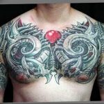 фото тату биомеханика на груди 06.04.2019 №011 - chest biomechanics tatt - tattoo-photo.ru