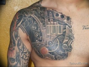 фото тату биомеханика на груди 06.04.2019 №013 - chest biomechanics tatt - tattoo-photo.ru