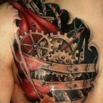 фото тату биомеханика на груди 06.04.2019 №027 - chest biomechanics tatt - tattoo-photo.ru