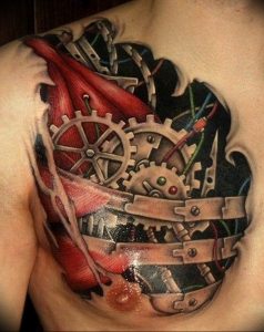 фото тату биомеханика на груди 06.04.2019 №027 - chest biomechanics tatt - tattoo-photo.ru