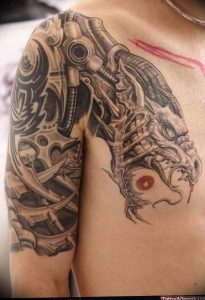 фото тату биомеханика на груди 06.04.2019 №028 - chest biomechanics tatt - tattoo-photo.ru