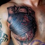 фото тату биомеханика на груди 06.04.2019 №034 - chest biomechanics tatt - tattoo-photo.ru