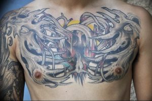 фото тату биомеханика на груди 06.04.2019 №042 - chest biomechanics tatt - tattoo-photo.ru