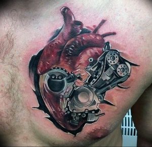 фото тату биомеханика на груди 06.04.2019 №046 - chest biomechanics tatt - tattoo-photo.ru