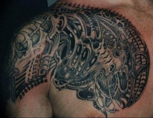 фото тату биомеханика на груди 06.04.2019 №051 - chest biomechanics tatt - tattoo-photo.ru