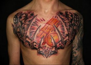 фото тату биомеханика на груди 06.04.2019 №059 - chest biomechanics tatt - tattoo-photo.ru