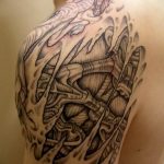 фото тату биомеханика на плече 06.04.2019 №035 - tattoo biomechaniс - tattoo-photo.ru