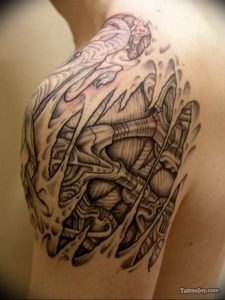 фото тату биомеханика на плече 06.04.2019 №035 - tattoo biomechaniс - tattoo-photo.ru