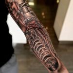 фото тату биомеханика на предплечье 06.04.2019 №028 - forearm biomecha - tattoo-photo.ru