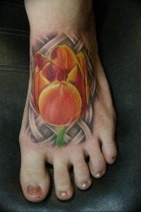 фото тату тюльпан на ноге 06.04.2019 №006 - tattoo tulip on foot - tattoo-photo.ru
