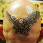 фото татуировки на затылке 24.09.2019 №033 -the back of the head tattoo- tattoo-photo.ru