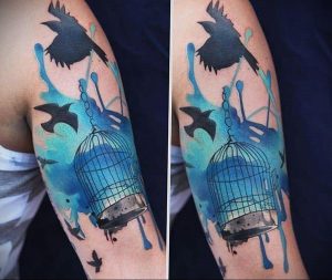 птица вылетает из клетки тату 02.01.2019 №014 -bird cage tattoo- tattoo-photo.ru
