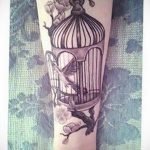 птица вылетает из клетки тату 02.01.2019 №015 -bird cage tattoo- tattoo-photo.ru