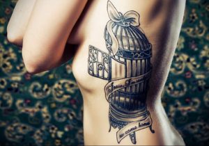 птица вылетает из клетки тату 02.01.2019 №016 -bird cage tattoo- tattoo-photo.ru