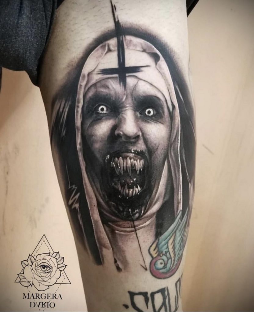 татуировка монашка на руке