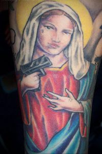 Тату Монашка с оружием 16.02.2020 №1008 -nun tattoo with gun- tattoo-photo.ru