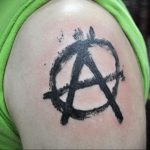Фото знак анархии тату 24.03.2020 №015 -tattoo anarchy- tattoo-photo.ru