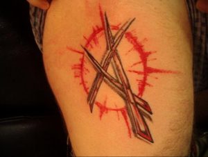 Фото знак анархии тату 24.03.2020 №017 -tattoo anarchy- tattoo-photo.ru