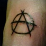Фото знак анархии тату 24.03.2020 №025 -tattoo anarchy- tattoo-photo.ru