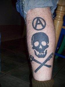 Фото знак анархии тату 24.03.2020 №031 -tattoo anarchy- tattoo-photo.ru