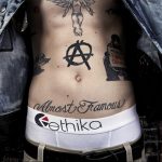 Фото знак анархии тату 24.03.2020 №049 -tattoo anarchy- tattoo-photo.ru