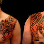 Фото тату с тигром на лопатке 09.03.2020 №013 -tattoo on the shoulder- tattoo-photo.ru