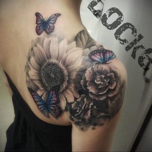Фото тату с цветами на лопатке 09.03.2020 №002 -tattoo on the shoulder- tattoo-photo.ru