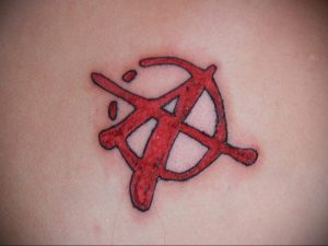 Фото знак анархии тату 24.03.2020 №010 -tattoo anarchy- tattoo-photo.ru