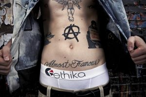 Фото знак анархии тату 24.03.2020 №049 -tattoo anarchy- tattoo-photo.ru