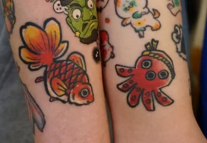 Фото тату золотая рыбка 07,12,2021 - №202 - goldfish tattoo - tattoo-photo.ru