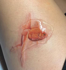 Фото тату золотая рыбка 07,12,2021 - №235 - goldfish tattoo - tattoo-photo.ru