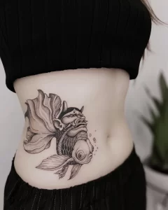 Фото тату золотая рыбка 07,12,2021 - №116 - goldfish tattoo - tattoo-photo.ru