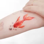 Фото тату золотая рыбка 07,12,2021 - №498 - goldfish tattoo - tattoo-photo.ru