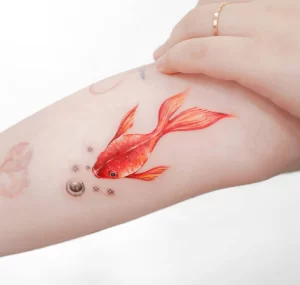 Фото тату золотая рыбка 07,12,2021 - №498 - goldfish tattoo - tattoo-photo.ru