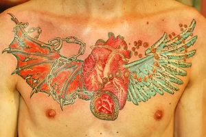 Фото тату на грудине сердце 02.01.22 №0002 - tattoo heart - tattoo-photo.ru