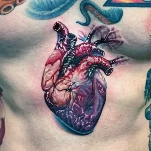 Фото тату на грудине сердце 02.01.22 №0003 - tattoo heart - tattoo-photo.ru